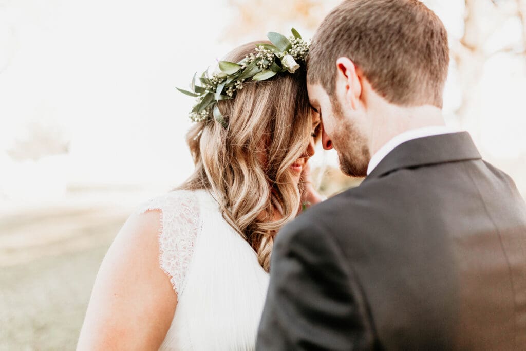 Bride and Groom with foreheads touching. 