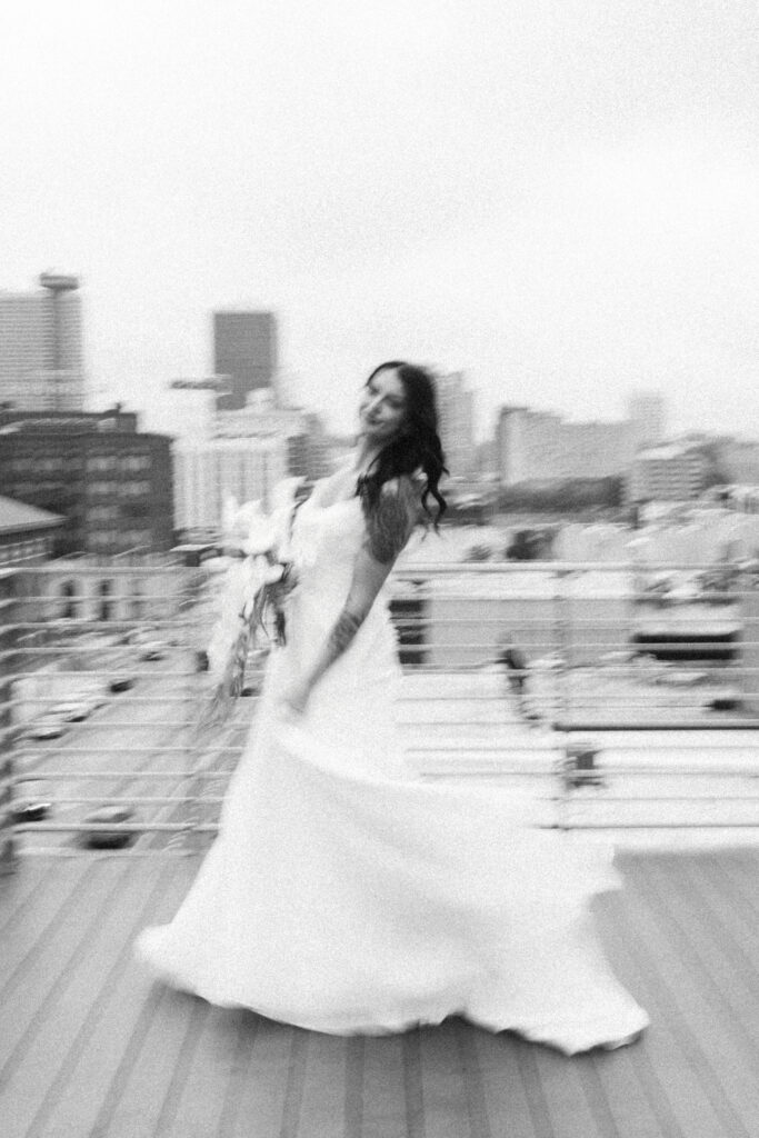 Bride spinning in her wedding dress.