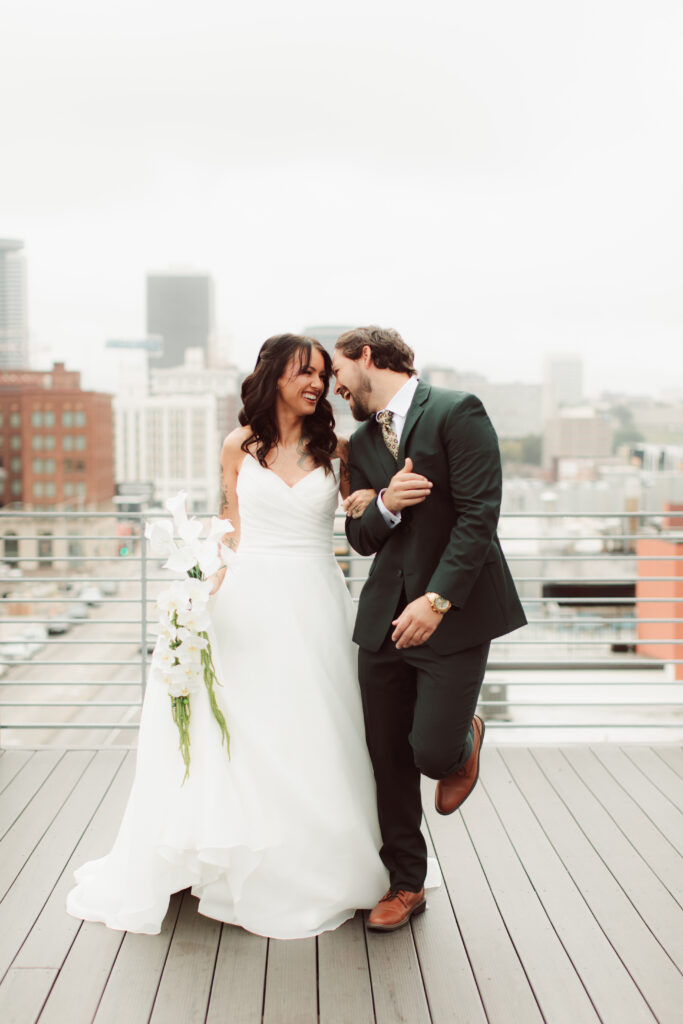 Bride and groom walking and having fun.