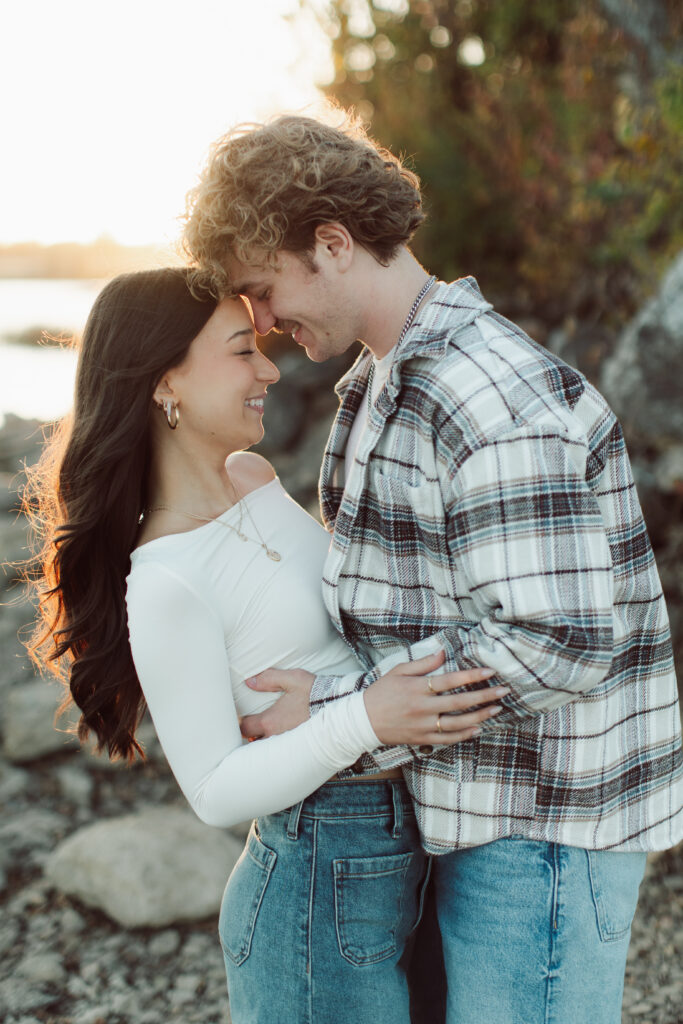 Couple touching noses during their engagement session. 