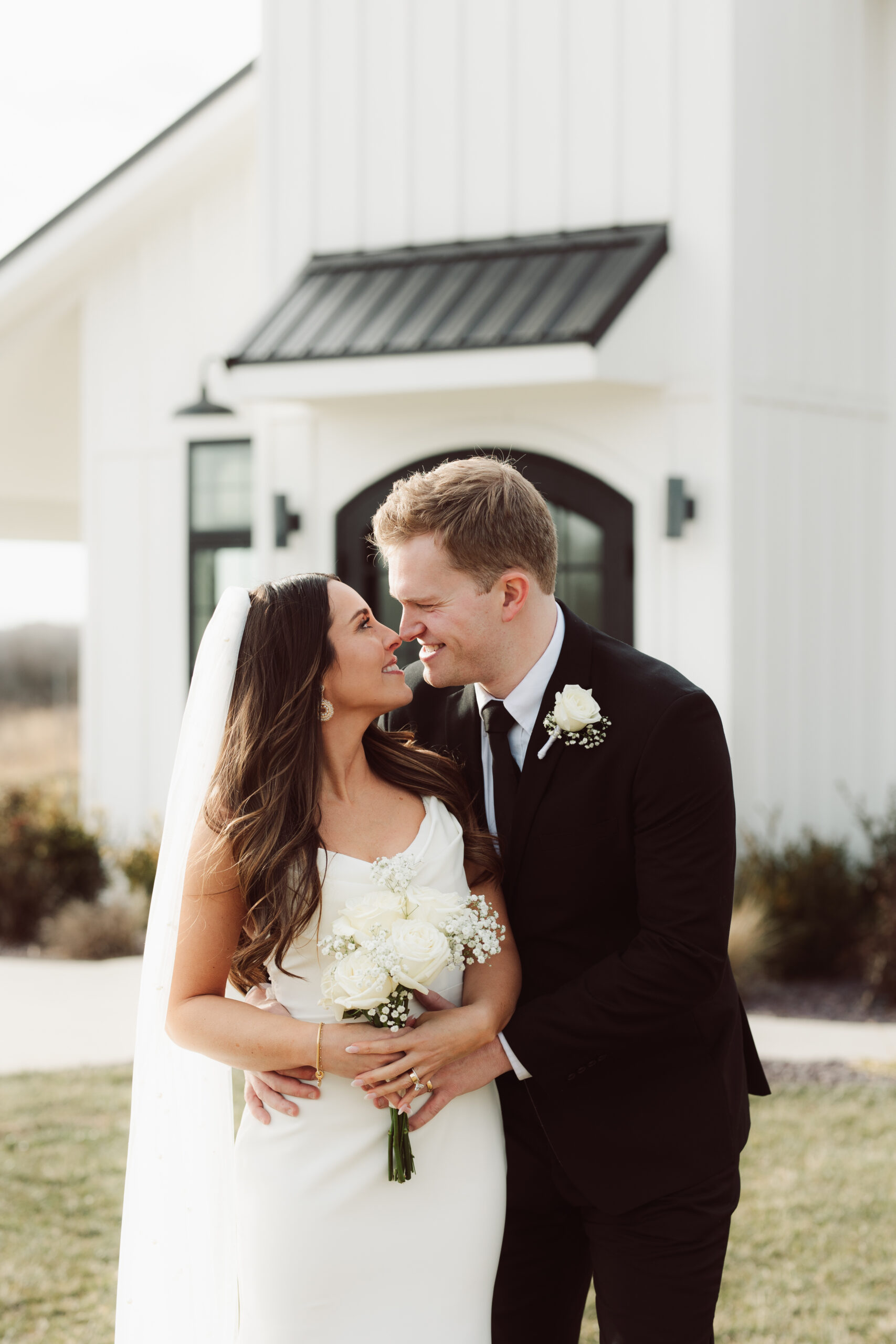 Bride and groom outside of chapel